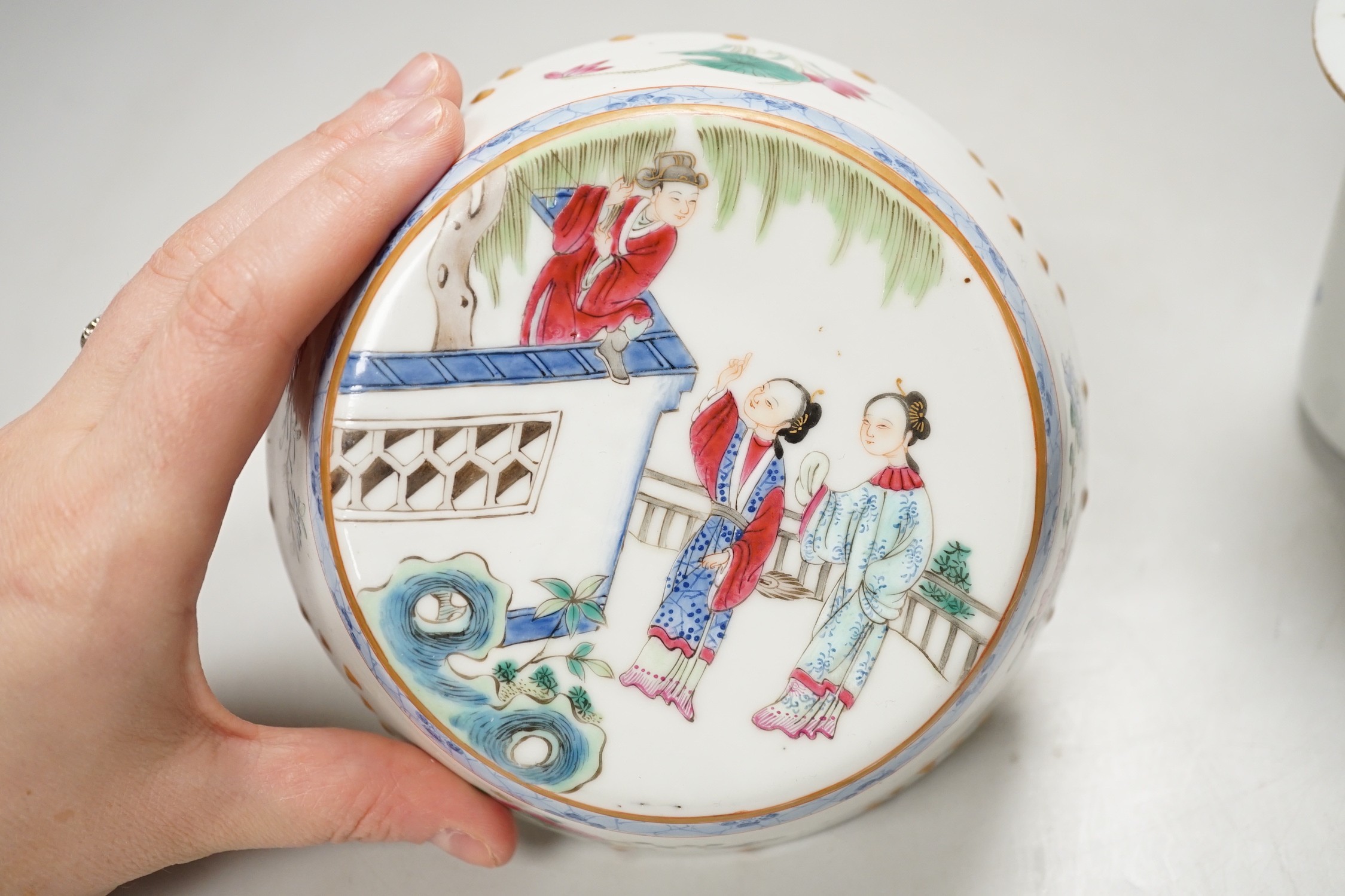 A Chinese famille rose teapot and a cover, together with a similar dish. 12cm tall